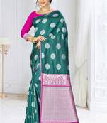 Green woven banarasi silk saree with blouse