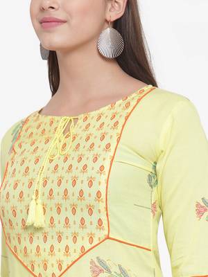 Yellow printed rayon kurtas-and-kurtis 5