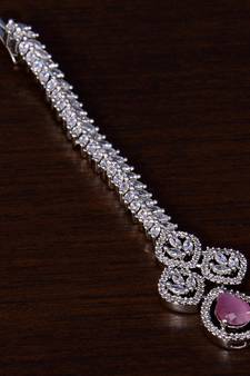 Rhodium Plated Baby Pink and AD Stone Embellished Designer Tikka 217MTS120