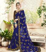 Blue embroidered georgette saree with blouse