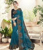 Teal embroidered georgette saree with blouse