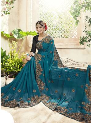Teal embroidered georgette saree with blouse 2