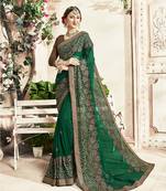 Green embroidered georgette saree with blouse
