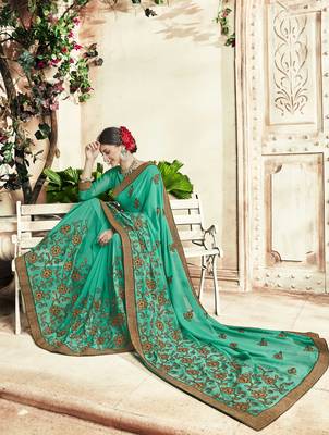 Sea green embroidered georgette saree with blouse 2