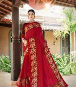 Red embroidered fancy fabric saree with blouse