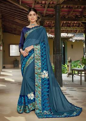 Teal embroidered fancy fabric saree with blouse 1