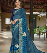 Teal embroidered fancy fabric saree with blouse
