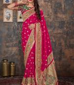 Pink woven banarasi silk saree with blouse