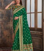 Green woven banarasi silk saree with blouse