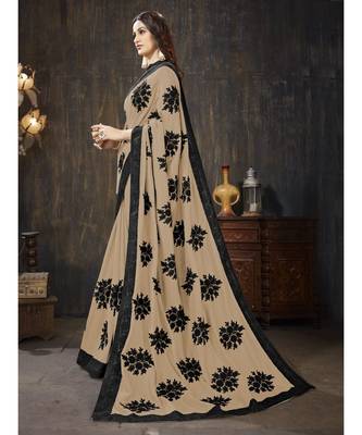Beige embroidered georgette saree with blouse 2