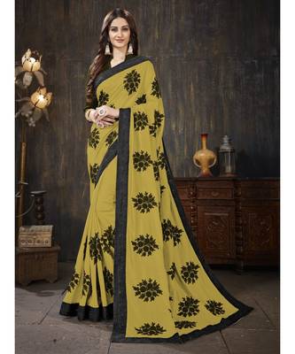 Mustard embroidered georgette saree with blouse 1