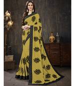 Mustard embroidered georgette saree with blouse