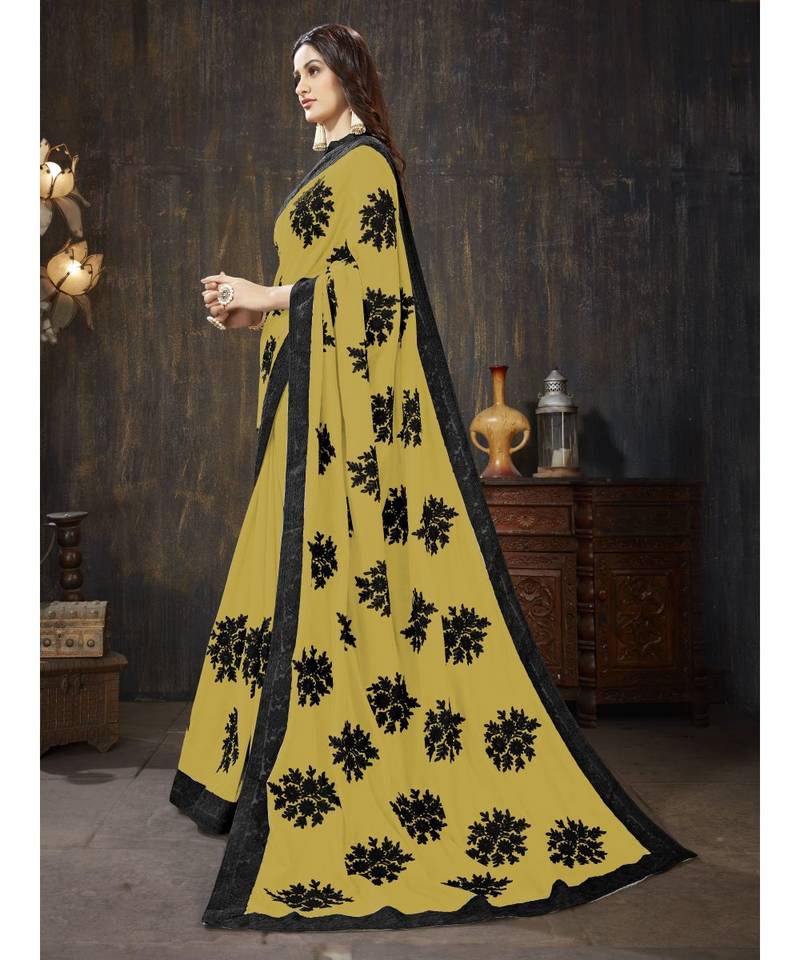 Mustard embroidered georgette saree with blouse