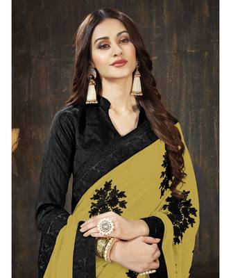 Mustard embroidered georgette saree with blouse 5