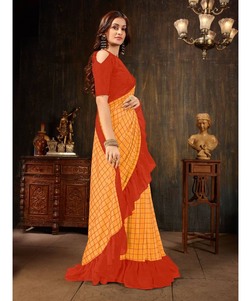 Orange embroidered georgette saree with blouse