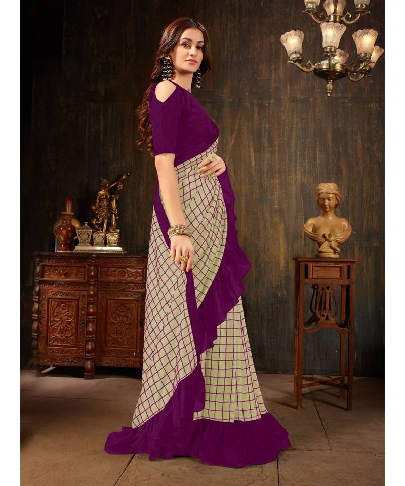 Beige embroidered georgette saree with blouse