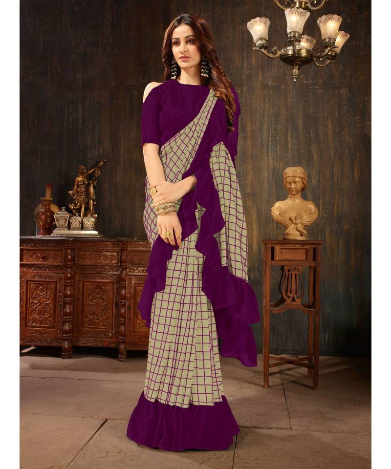 Beige embroidered georgette saree with blouse