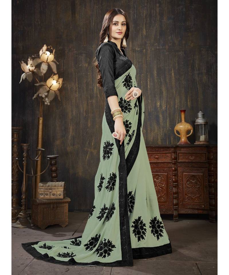 green embroidered georgette saree with blouse