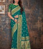 Teal woven banarasi silk saree with blouse