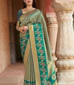 Turquoise woven banarasi silk saree with blouse