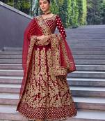 Dark-red embroidered velvet semi stitched lehenga