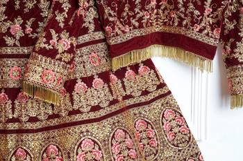 Maroon embroidered velvet semi stitched lehenga 3