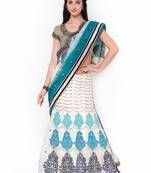 Cream Embroidered Net Saree With Blouse