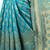 Turquoise woven jacquard saree with blouse
