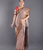 Beige And Brown Tussar Silk Saree With Zari Border