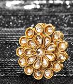 Gold coloured stone rings