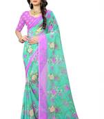 Turquoise printed chiffon saree with blouse