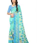 Turquoise printed chiffon saree with blouse