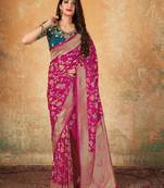 Pink woven banarasi silk saree with blouse