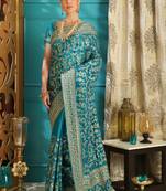 Teal embroidered silk saree with blouse