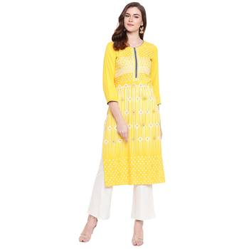 Yellow printed rayon kurtas-and-kurtis 1