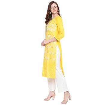 Yellow printed rayon kurtas-and-kurtis 4