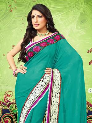 Dark green embroidered georgette saree with blouse 1
