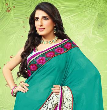 Dark green embroidered georgette saree with blouse 2