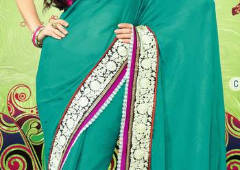 Dark green embroidered georgette saree with blouse 3