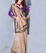 Beige embroidered dupion silk saree with blouse