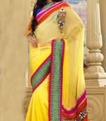 Yellow embroidered georgette saree with blouse