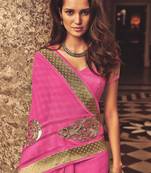 Pink embroidered georgette saree with blouse