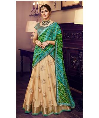 Tussar Color Net Lehenga With Green Handloom Choli And Green Bandhani Colour Georgette Dupatta 1
