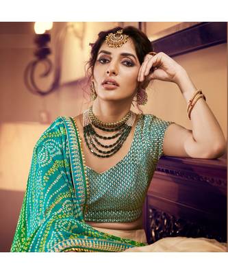 Tussar Color Net Lehenga With Green Handloom Choli And Green Bandhani Colour Georgette Dupatta 2