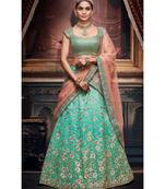 Firozi Shaded Colour Handloom Silk Lehenga Choli With Peach Colour Net Dupatta