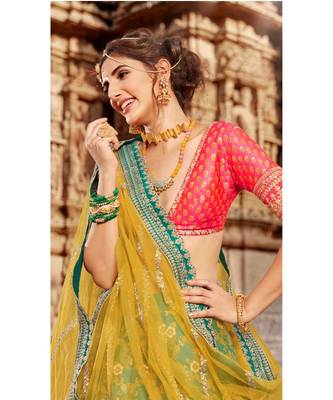 Ferozi Colour Jacquard Lehenga With Rani Colour Jacquard Choli And Yellow Colour Net Dupatta 2