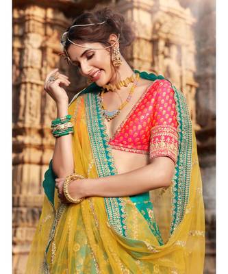 Ferozi Colour Jacquard Lehenga With Rani Colour Jacquard Choli And Yellow Colour Net Dupatta 4