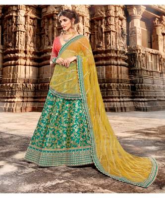 Ferozi Colour Jacquard Lehenga With Rani Colour Jacquard Choli And Yellow Colour Net Dupatta 5