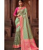 Green woven blended silk banarasi saree with blouse