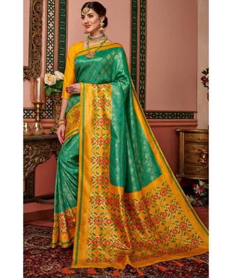 Green woven blended silk kanjivaram saree with blouse 1